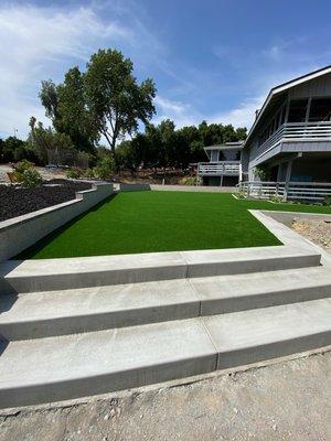 Retaining wall, planters, stairs and turf