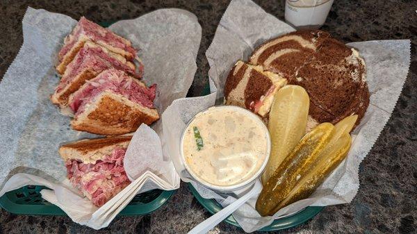 Left :  the Reuben   Right : egg salad on marbled rye with potato salad and pickle spears.