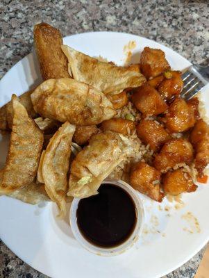 TSO chicken, an egg roll, and an order of fried pot stickers.