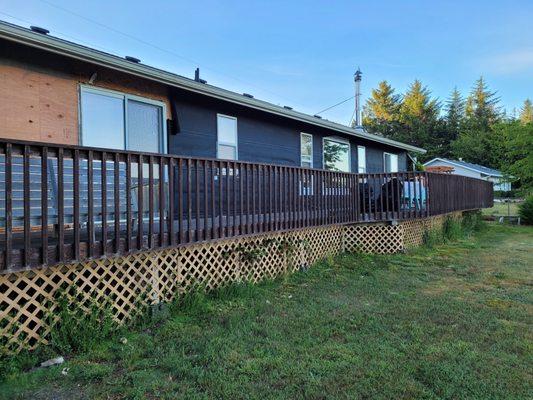 The old deck they ripped down after wisely using it to get a lot of the work done using the deck for easy access!