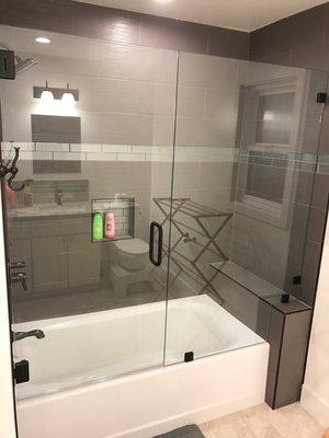 Frameless shower glass installed by Golden Glass