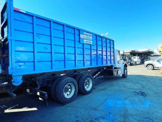 Fresh coat of paint and ready to go!  Pictured is our 40YD roll off dumpster on our new clean fleet vehicle.