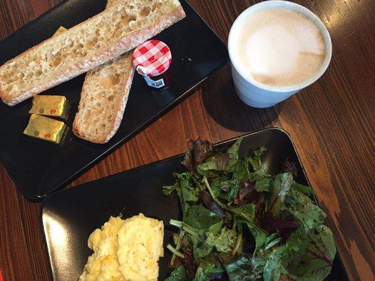 Baguette with butter/jam and egg scramble with side salad