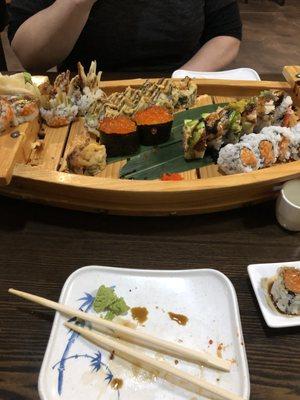 Got a nice variety of sushi which they serve on a cute boat platter. Delicious and fresh fish!