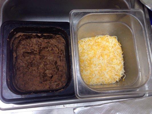 Retried beans & shredded cheese for tacos