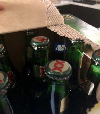 Tampered 12 pack from Queens Chapel Liquors.