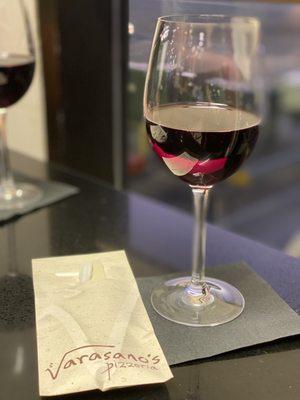 Nothing like a Pinot noir while waiting for a delicious pizza and my flight!