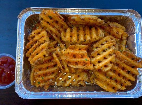 Delicious homemade waffle fries. Served crispy.