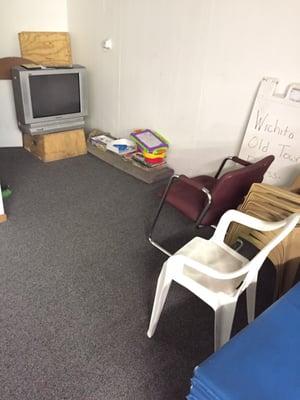 Small kids area with the TV and stuff to play with