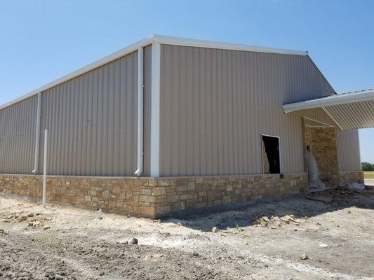 The rock completion around the building.