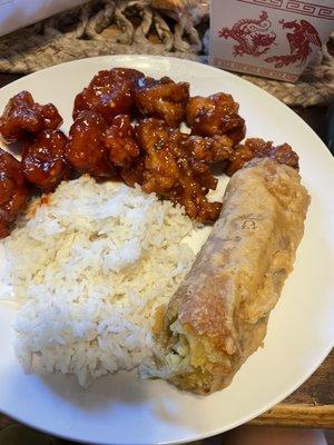 Some spicy sesame chicken , spicy general tso and egg roll