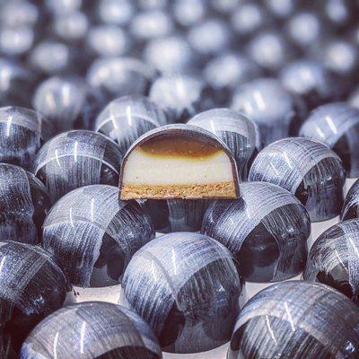 Vanilla bean-salted caramel cheesecake bonbon