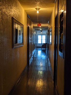 Hallway upstairs by the hotel rooms