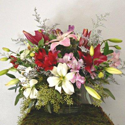 Seasonal Arrangements available in many sizes and colors.