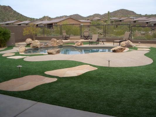 Pool wrapped with synthetic turf by TurfDIRECT.