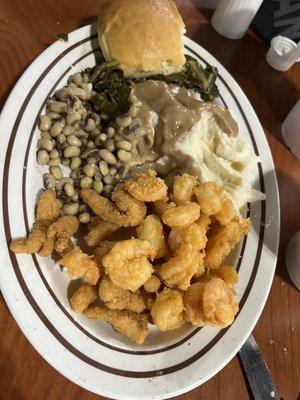 Shrimp, clams, beef tips, mashed potatoes, black eyed peas, collard greens, and  yeast roll