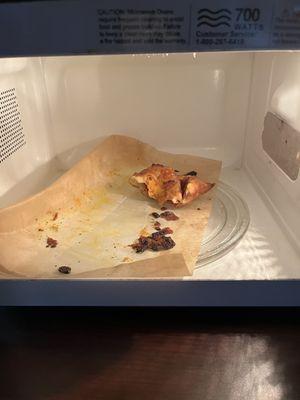 Old pizza crust left in the microwave