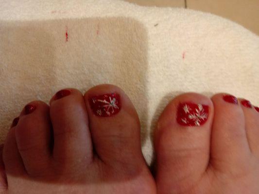 Pretty holiday toes.. Courtesy of David and Sara!