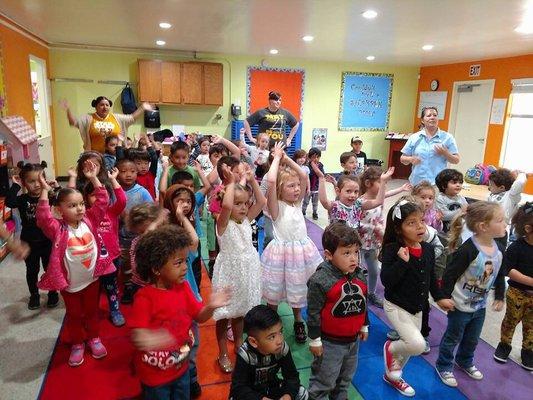 Praise and Worship time as a school. The children love to sing and dance