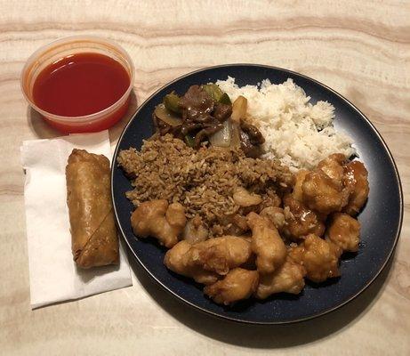 Sweet and sour chicken, sesame chicken, beef onion and green peppers, shrimp fried rice.