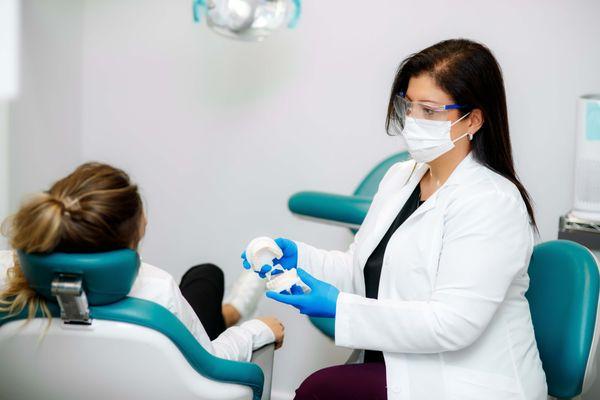 If you have a bad bite, it is important to work with both your dentist and an orthodontist to discuss options for improving your smile