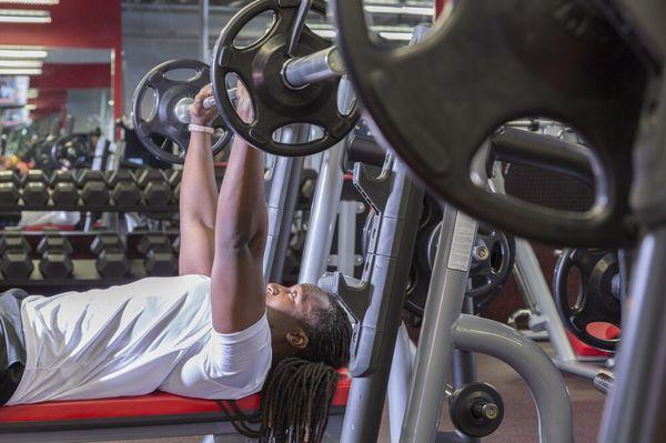 Plate weights, squat rack, and bench press for the big guys!