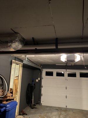 Garage, pipe strapped