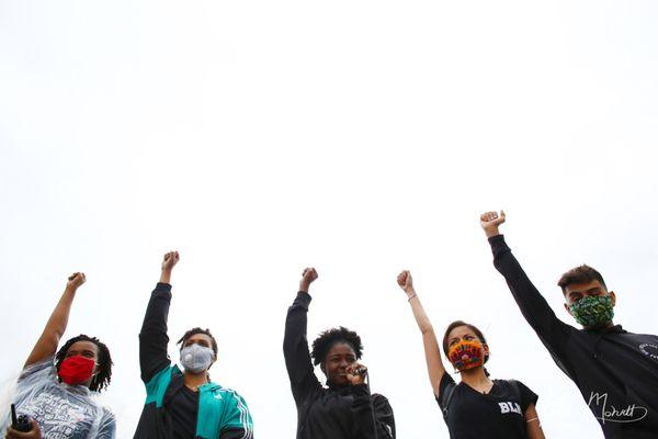 Youth-led BLM march on Pena Boulevard in Denver. Photo by Kevin Mohatt