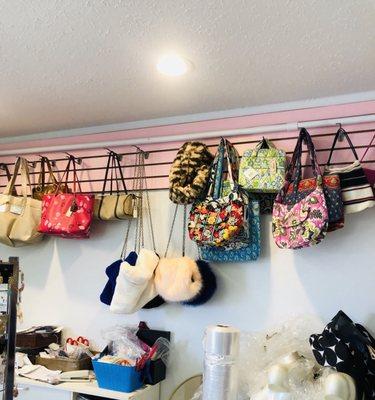 Vera Bradley, MK, Coach bags. The fuzzy crossbody bags were my fave!