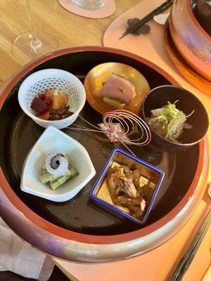 "Snack plate"  incredible mistake mushroom, one of my favorites (Tataki fish), pickles, luscious duck and eggplant. Amazing