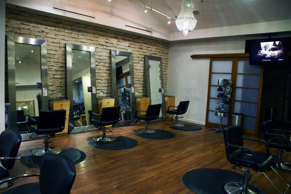 The chic, clean styling area and salon chairs at Breeze Salon and Day Spa, the best salon and spa in Georgetown, featuring Aveda services.