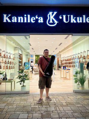 With my newly purchased ukulele.