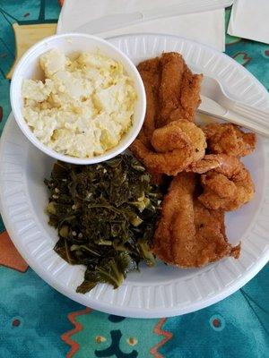 Fried fish and shrimp with greens and potato salad