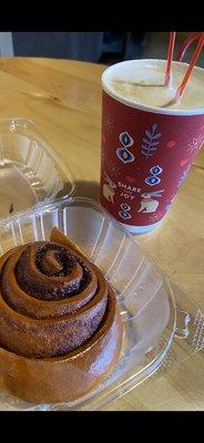 Cinnamon roll and a Decaf Cafe Latte.