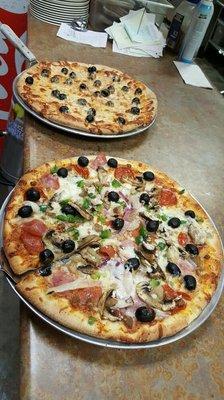 Yummy delicious home made supreme pizzas .... four meats , four vegetables... 16" for only $14.95 ...yummy:)