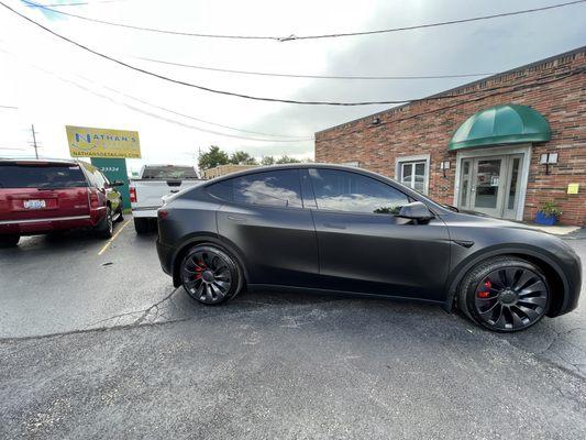 Model Y Performance with matte black PPF, ceramic coating, window tinting, and headlight/rear light tinting.