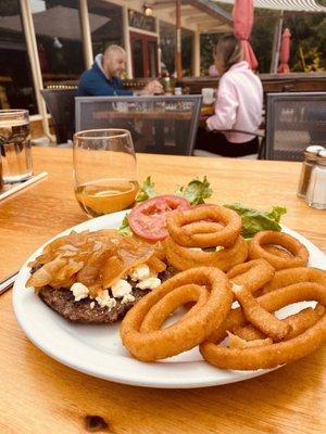 Burger with blue cheese crumbles, caramelized, onion rings, and deep fried onion rings. No bun for me, however my guest loved hers