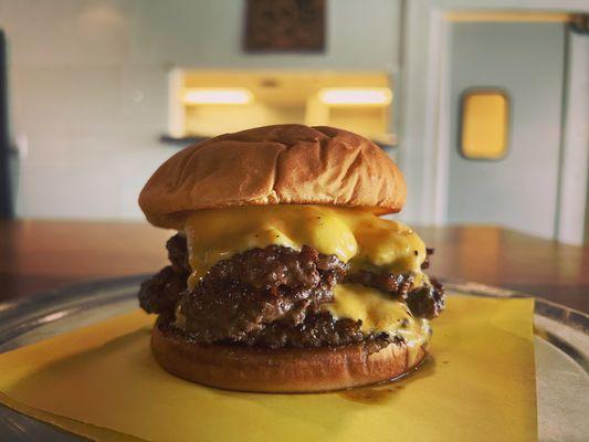 The Doug... triple cheese burger..with whatever you want.