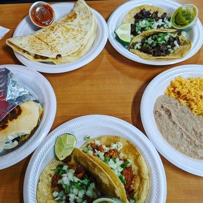 El pastor tacos, torta and steak quesadilla.