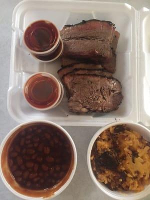 Brisket, sauces, smokey beans, cheesy potatoes