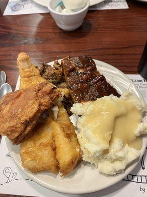 Fish, chicken, ribs, and chicken gizzards from the Friday night buffet