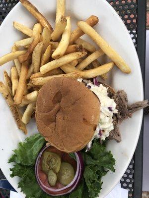 Pulled pork sandwich with coleslaw and fries