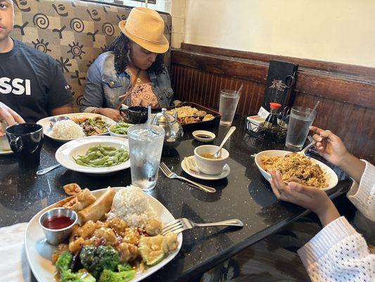 Bottom Left: General Tso's  Bottom Right: chicken Fried Rice Top Left: Spicy Mongolian Top Right: #7 Bento Box