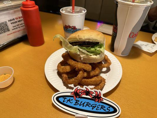 Burger with onion rings and a sticker