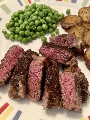 Perfectly grilled Australian Wagyu ribeye steak!  Hubby and I split one steak and it was delicious!