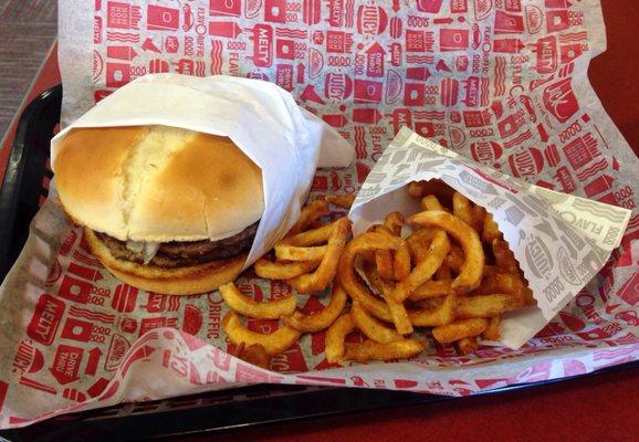 Double burger with curly fries.