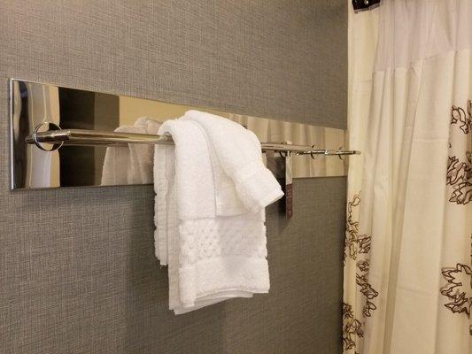 Great place to hang towels, so they can Actually dry!  Nice!