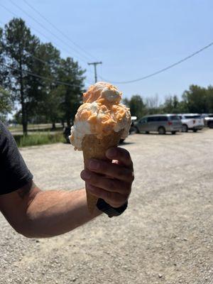 Small creamsicle on a waffle cone