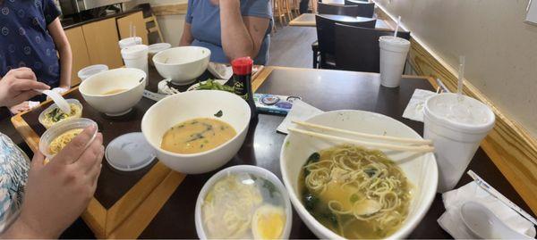 Table with edamame chicken, and spicy ramen