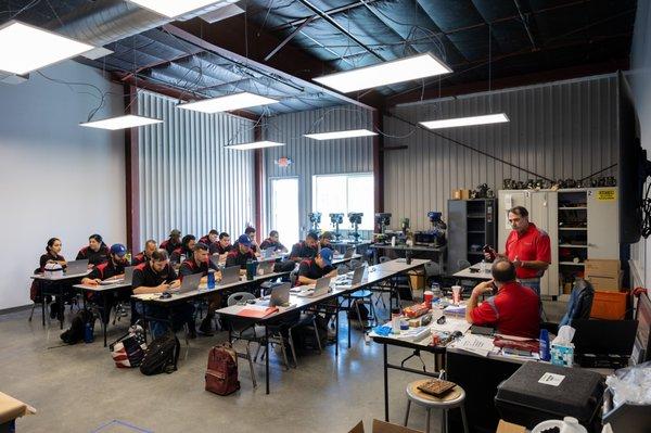 Spartan College Riverside Aviation Maintenance Technology students in class in the new hangar